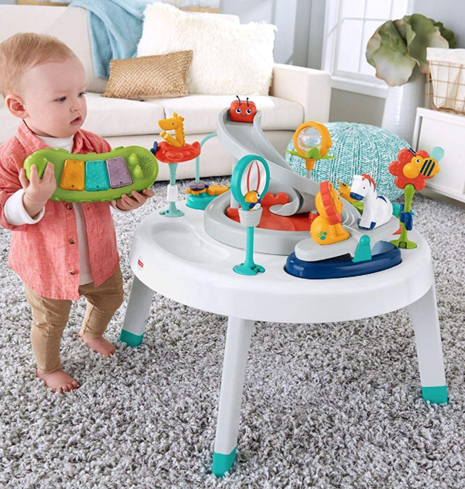 Mesa de actividades para bebé con asiento giratorio de Fisher
